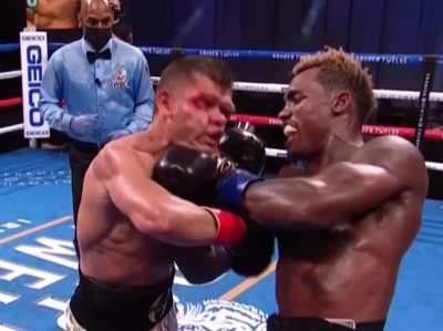 Jermall Charlo lands an uppercut on Sergiy Derevyanchenko, inexplicably turning The Technician's head into Jell-O