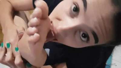 Pretty girl cleaning her soles after cumshot