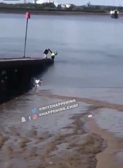 Cop Gives A Man Some Swimming Lessons