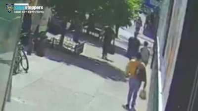 Moment Asian woman, 75, is sucker-punched by thug who left her with two black eyes, a fractured eye socket and broken nose in New York City as hate crimes soar
