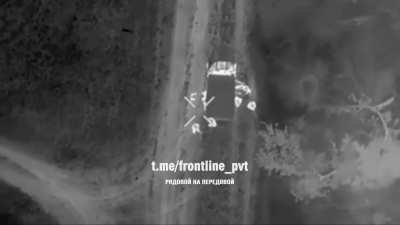 Drone drops onto Ukrainian soldiers at night 