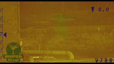 A sniper spots an enemy assault group gathering behind a fence. After measuring the distance, the sniper begins to engage. Avdiivka, near the coking plant, Donetsk region.
