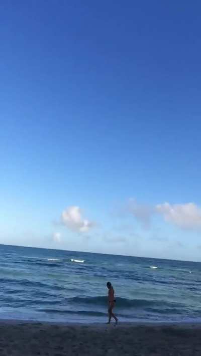 Trying to be sneaky on the beach