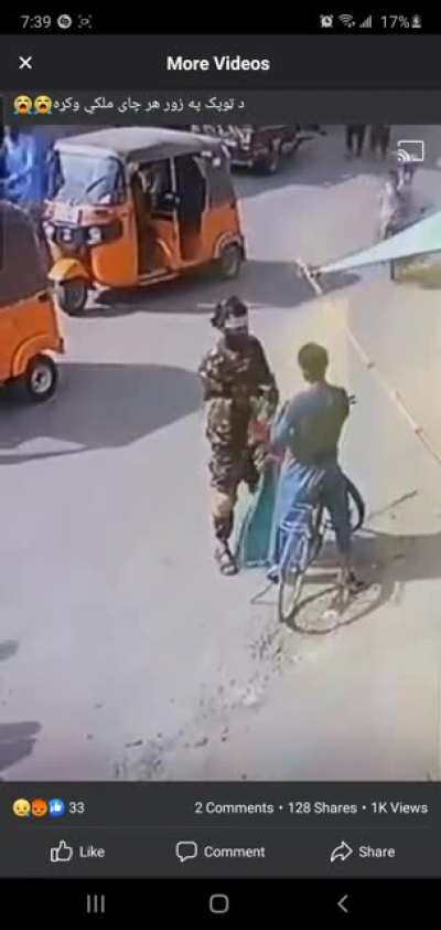 Taliban pig 🐷 snatches Afghan flag from civilian