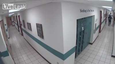 Intruder Charges at an officer in Saint Petersburg Police station, Florida.