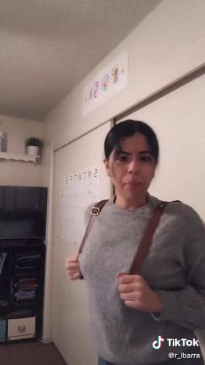 Human goes crazy over backpack purse contraption.