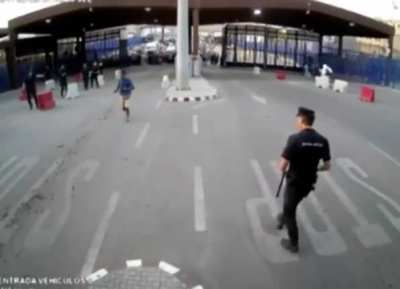 Spanish police take man down holding a knife