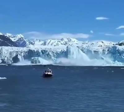 An iceberg rising and forming a huge pillar after falling