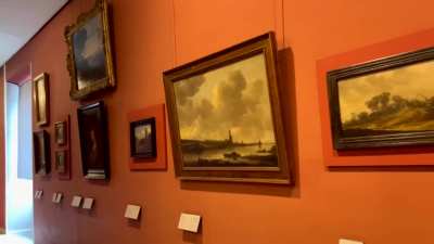 Activists hang arrest photo of piece of shit Pedo Prince Andrew at The Louvre