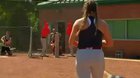 Softball player practicing to avoid throwing the ball right down the middle... cement blocks stacked on the plate and didn’t hit a single one