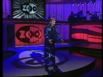 Standup Comedian performs as a robot, his movements are uncanny