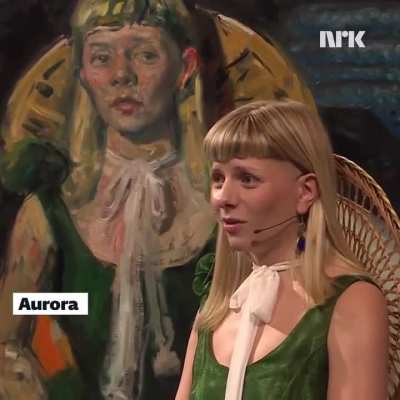 Aurora is stunned by her portrait, painted by Vebjørn Sand and Bjørg Thorhallsdottir. Sold for 323 000 Norwegian kroner in connection with TV aksjonen 2025. Money went to the Atlas Alliance.

Source: NRK.