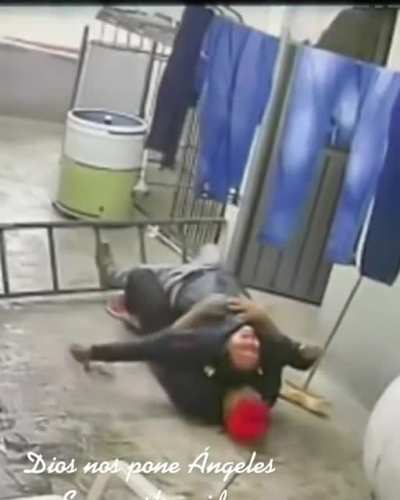 This guy saving his co-worker at the last moment after ladder slips