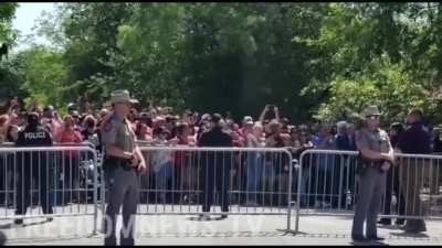 Crowd Boos Texas Gov Greg Abbott as he arrives at the memorial outside of Uvalde Elementary School.