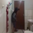 Boy and his cat trying to catch a mouse