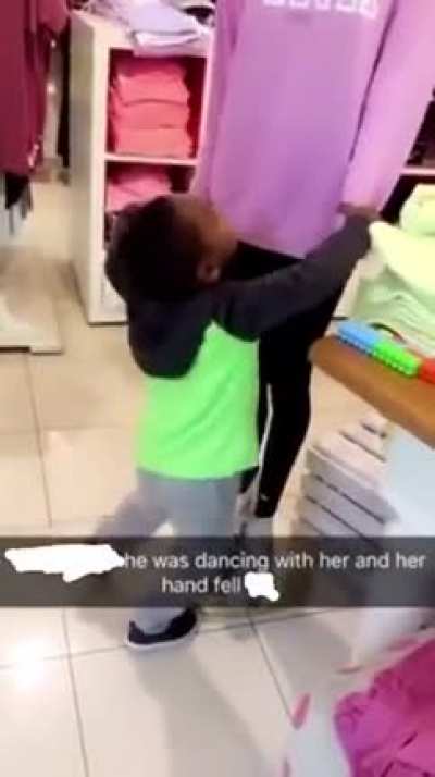 Kid dances with mannequin then hand falls off