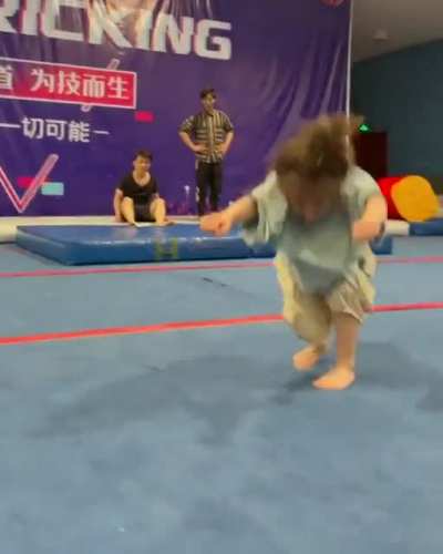 Showing off her moves for dad