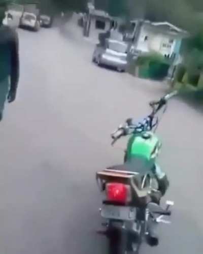 Dismounting a motorcycle (sound recommended)