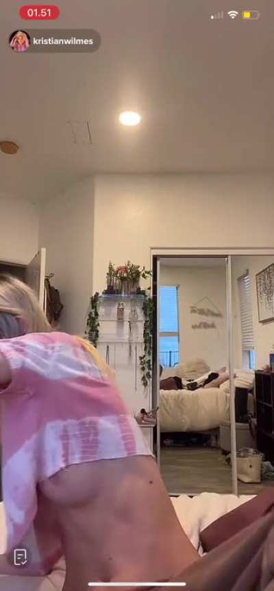 In front of her mom