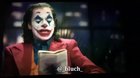 Joker tells a funny joke and everyone laughs