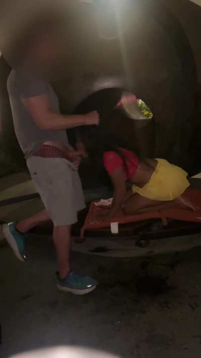Asian wife sucking white cock outdoors