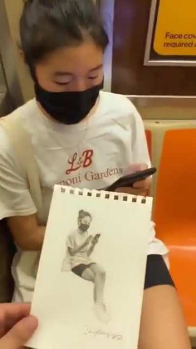 Artist drawing strangers on the NYC subway and gives them their portraits