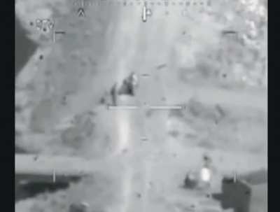 An AH-64D Apache waits for clearance as the Taliban place an IED. As the clearance arrives the IED detonates on the Taliban. (Afghanistan, Date Unknown)