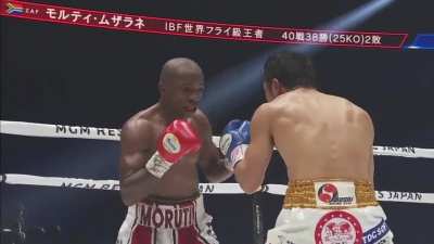 Mthalane makes Yaegashi wince in pain from a body shot