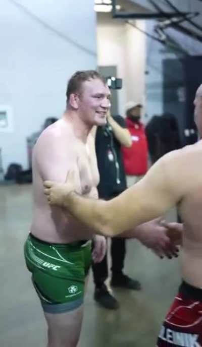 Fighter teaches his opponent the submission he used to beat him