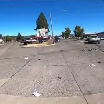 Who's at fault, truck that stopped or motorcyclist going too fast?