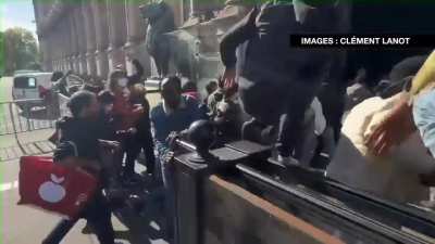 llegal immigrants took over City Hall in Paris yesterday demanding better benefits and accomodations