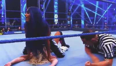 Sasha pummels Lexi and then pins both her arms down