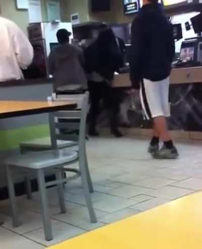 McDonald's cashier in Greenwich hits two customers with a stick after they slap him and jump the counter