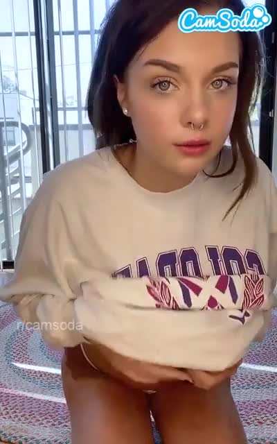 She Lets Us Take a Peek Under that Sweatshirt