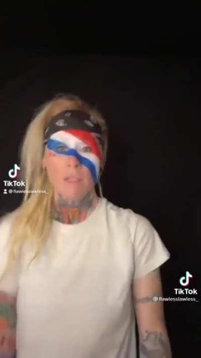 Her pride flag is red, white, and blue.