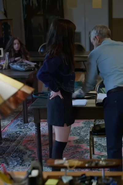 This looks like a scene where the student wants extra credit from the college professor she would be so good in role playing