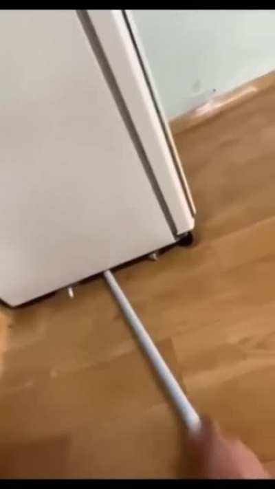 Great way to clean under your fridge