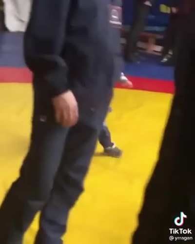 Literal toddler steals a guy’s phone, squares up, and absolutely decks him.