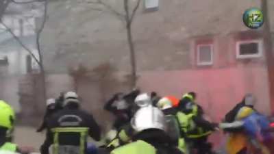 French police charging firefighters, firefighters not having any of it