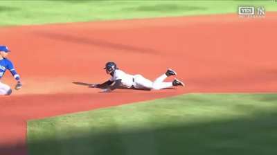 Jose Caballero executes a beautiful swim slide to avoid the tag and advance to second on the fly ball!