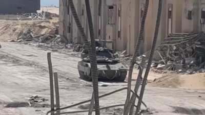 Al Qassam Brigades target a Merkava tank in Rafah.
