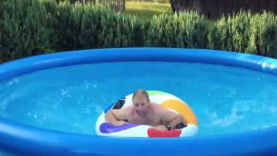 Riding on waves in a round swimming pool