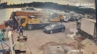 Boom Truck Loses Control, Crashes into Vehicle Ahead