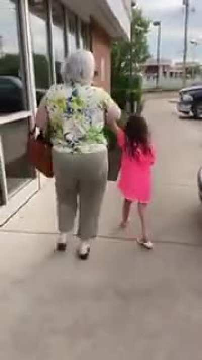 Racist woman get mad someone is wearing a BLM shirt, hits them with car.