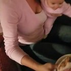 Her doctor said that I could start thinking about introducing her to solid foods if she started showing any interest... might this qualify?