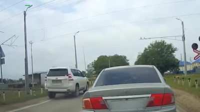 WCGW speeding through a railway crossing