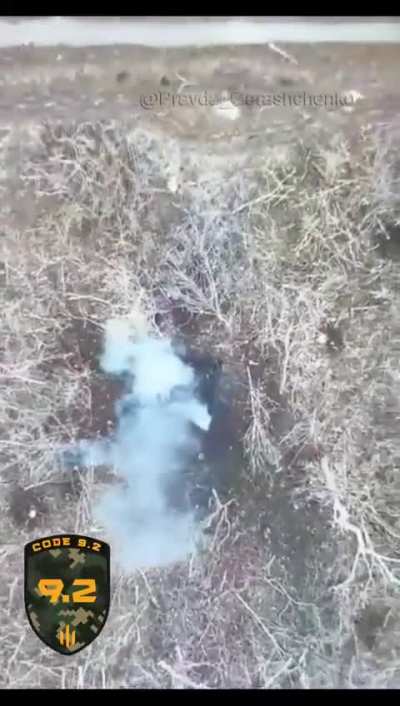 CODE 9.2 drone operators hits Russian soldier in face with dropped grenade before it explodes sending him flying.