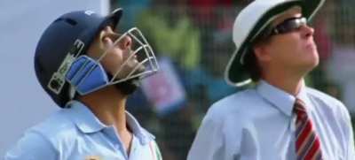 Cummins watching Glenn Maxwell from the other end.