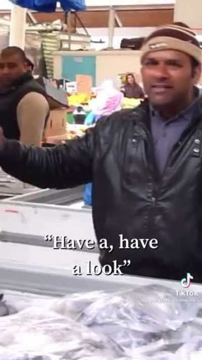 This man sure loves selling fish