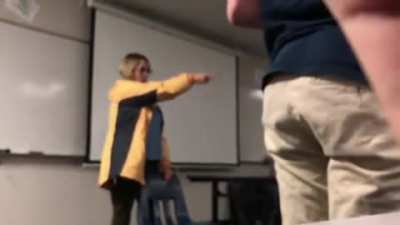 teacher lost her shit and starts cutting students hair